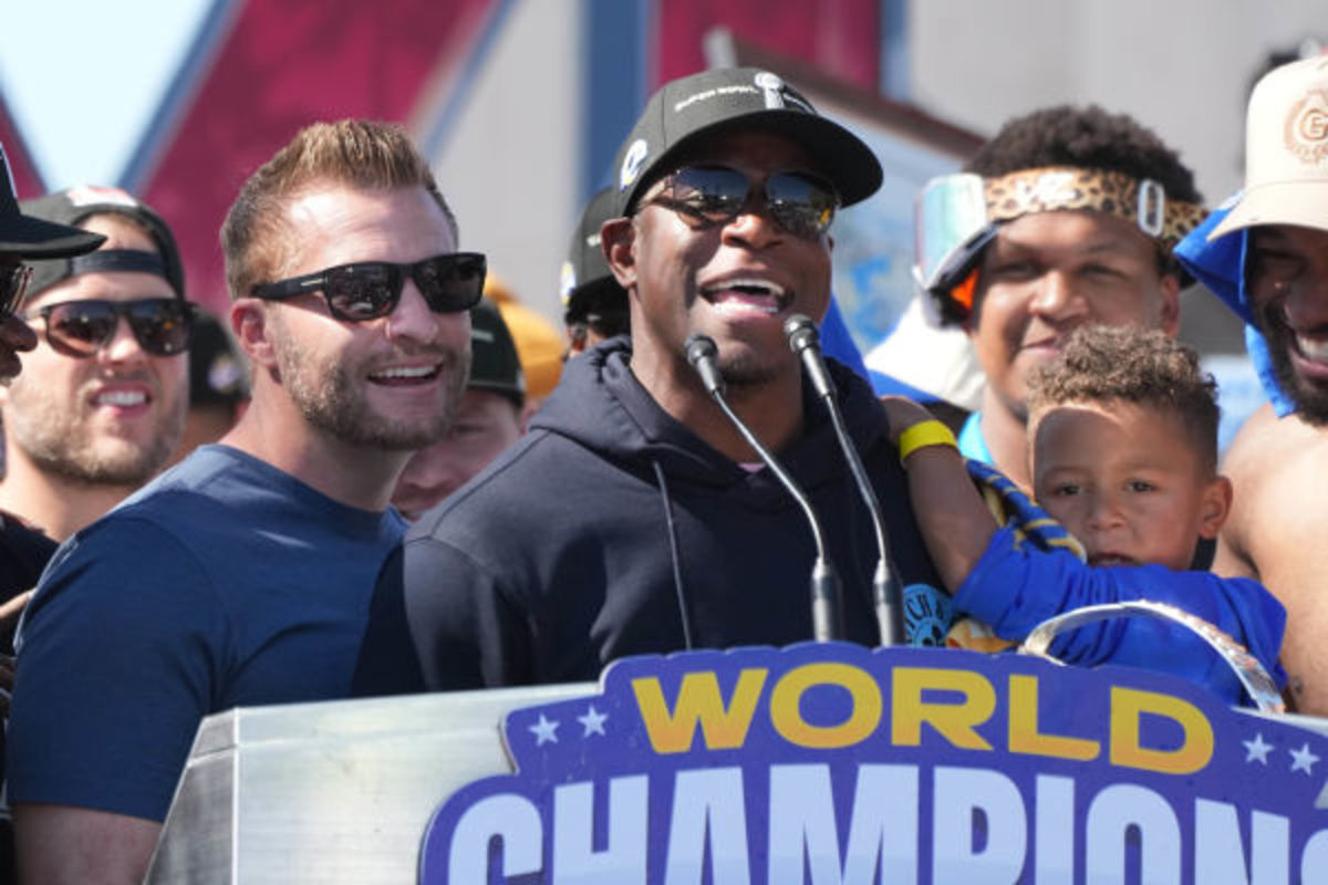 Feb 16, 2022; Los Angeles, CA, USA; Los Angeles Rams coach Sean McVay (left) and defensive coordinator Raheem Morris react during Super Bowl LVI championship rally at the Los Angeles Memorial Coliseum.